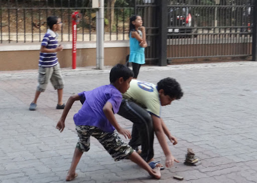 Kids playing lagori